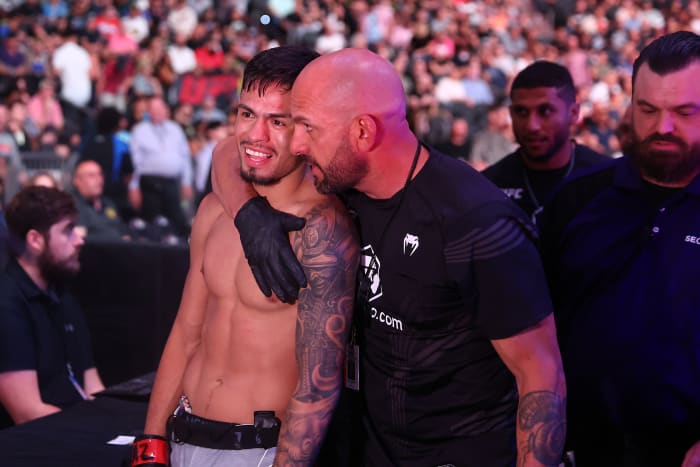 Brandon Royval celebrates his victory by submission against Matt Schnell during UFC 274 at Footprint Center.